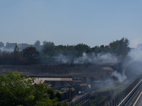 A fire is breaking out in Naples, Italy, on Sunday, in the Capodichino Airport area. The cloud of smoke is invading the A56 at the height of...