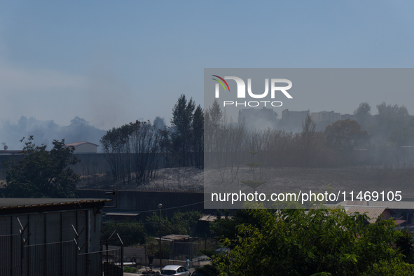 A fire is breaking out in Naples, Italy, on Sunday, in the Capodichino Airport area. The cloud of smoke is invading the A56 at the height of...