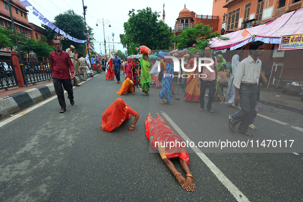 Hindu devotees are performing rituals as they take part in the annual religious 'Lakhi Pad Yatra' for the 'darshan' of Lord Kalyan, at Diggi...