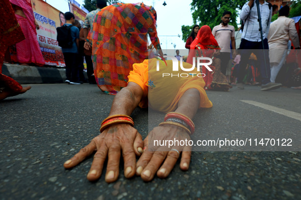 Hindu devotees are performing rituals as they take part in the annual religious 'Lakhi Pad Yatra' for the 'darshan' of Lord Kalyan, at Diggi...