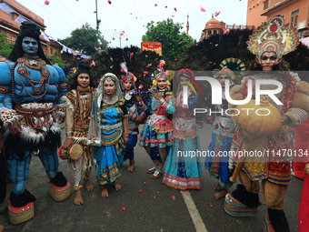 Artists are participating in the annual religious 'Lakhi Pad Yatra' for the 'darshan' of Lord Kalyan at Diggi Kalyan Ji temple in Jaipur, Ra...