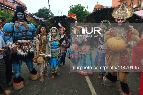 Artists are participating in the annual religious 'Lakhi Pad Yatra' for the 'darshan' of Lord Kalyan at Diggi Kalyan Ji temple in Jaipur, Ra...