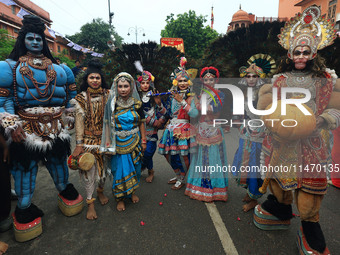 Artists are participating in the annual religious 'Lakhi Pad Yatra' for the 'darshan' of Lord Kalyan at Diggi Kalyan Ji temple in Jaipur, Ra...