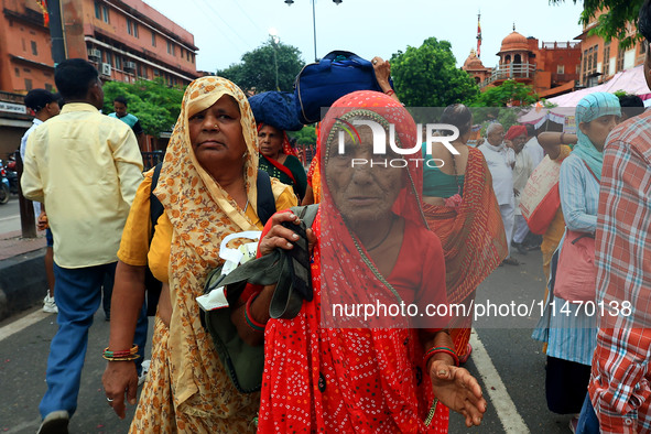 Hindu devotees are taking part in the annual religious 'Lakhi Pad Yatra' for the 'darshan' of Lord Kalyan, at Diggi Kalyan Ji temple in Jaip...