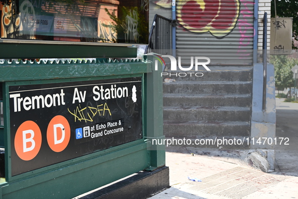 Blood is on the sidewalk and steps outside of the Tremont Av station. Two men are being slashed outside of the Tremont Avenue subway station...