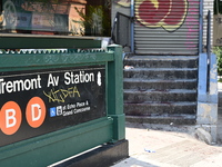 Blood is on the sidewalk and steps outside of the Tremont Av station. Two men are being slashed outside of the Tremont Avenue subway station...