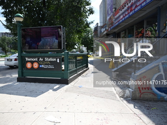 Blood is on the sidewalk and steps outside of the Tremont Av station. Two men are being slashed outside of the Tremont Avenue subway station...