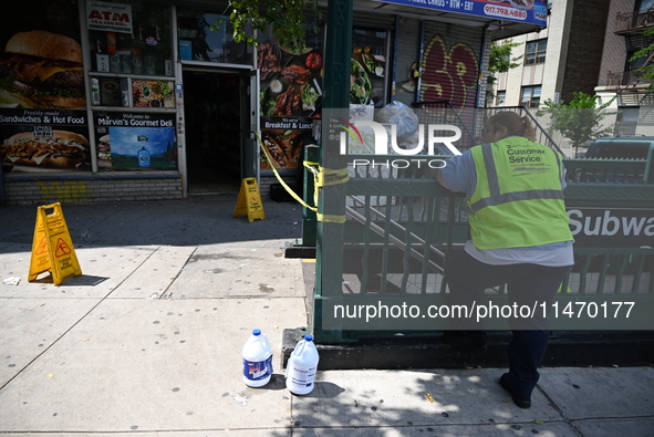 Blood is on the sidewalk and steps outside of the Tremont Av station. Two men are being slashed outside of the Tremont Avenue subway station...