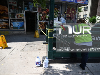 Blood is on the sidewalk and steps outside of the Tremont Av station. Two men are being slashed outside of the Tremont Avenue subway station...