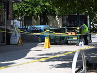 Blood is on the sidewalk and steps outside of the Tremont Av station. Two men are being slashed outside of the Tremont Avenue subway station...