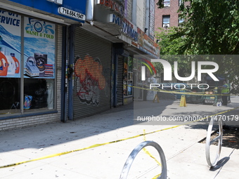 Blood is on the sidewalk and steps outside of the Tremont Av station. Two men are being slashed outside of the Tremont Avenue subway station...