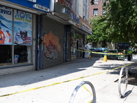 Blood is on the sidewalk and steps outside of the Tremont Av station. Two men are being slashed outside of the Tremont Avenue subway station...