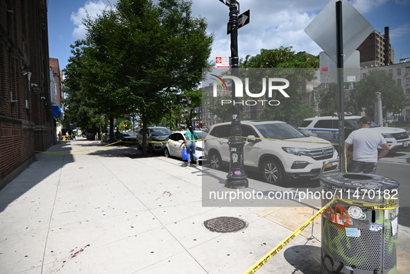 Blood is on the sidewalk outside of the Tremont Av station. Two men are being slashed outside of the Tremont Avenue subway station in Bronx,...