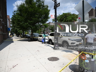 Blood is on the sidewalk outside of the Tremont Av station. Two men are being slashed outside of the Tremont Avenue subway station in Bronx,...