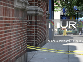 Blood is on the sidewalk outside of the Tremont Av station. Two men are being slashed outside of the Tremont Avenue subway station in Bronx,...