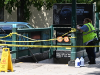 Blood is on the sidewalk outside of the Tremont Av station. Two men are being slashed outside of the Tremont Avenue subway station in Bronx,...