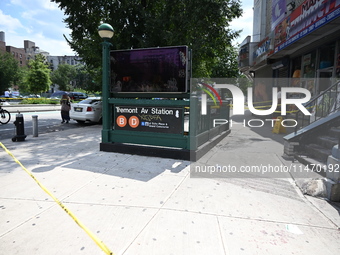 Blood is on the sidewalk and steps outside of the Tremont Av station. Two men are being slashed outside of the Tremont Avenue subway station...