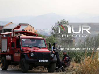 A forest fire is burning near the village of Larbaa Nath Reten, Tizi Ouzou, in the mountainous region of Kabyle, Algeria, on August 11, 2024...