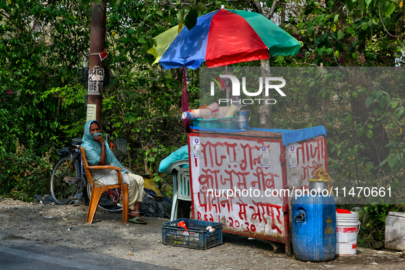 A juice stand is operating along the roadside in Haldwani, Uttarakhand, India, on April 23, 2024. 