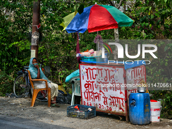 A juice stand is operating along the roadside in Haldwani, Uttarakhand, India, on April 23, 2024. (