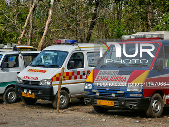 Ambulances are parking along the roadside in Haldwani, Uttarakhand, India, on April 23, 2024. (