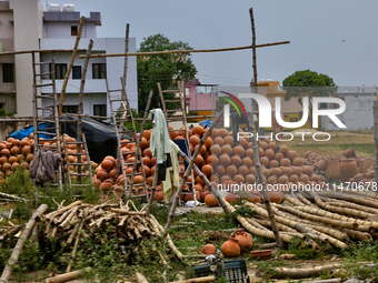 Clay pots are being sold at a small workshop in Haldwani, Uttarakhand, India, on April 23, 2024. (