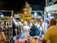 The procession of the Three Saints of Bisceglie is taking place amidst the stalls in Bisceglie, Italy, on August 11, 2024. Bisceglie is cele...