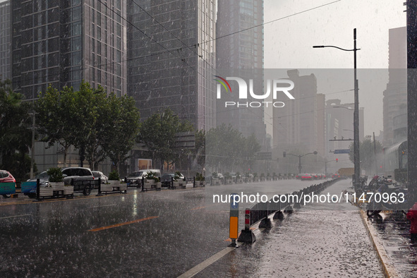 Heavy rainfall is occurring in Shanghai, China, on August 12, 2024. 