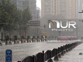 Heavy rainfall is occurring in Shanghai, China, on August 12, 2024. (