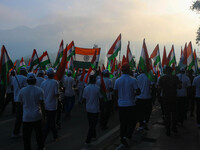 People are taking part in the Tiranga Rally ahead of India's Independence Day celebrations in Srinagar, Jammu and Kashmir, on August 12, 202...