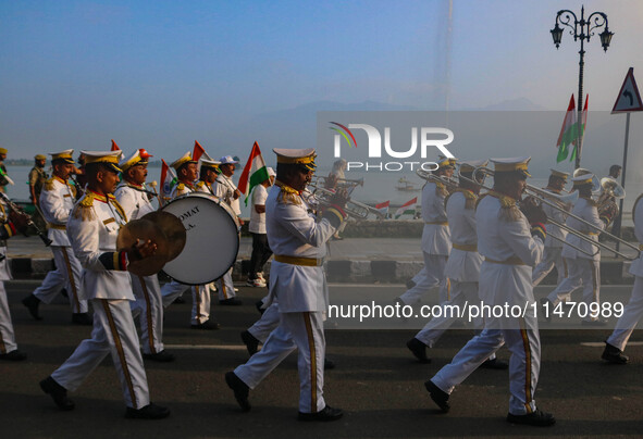 Indian Border Security Force (BSF) band members are performing during the Tiranga Rally ahead of India's Independence Day celebrations in Sr...