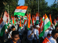 People are taking part in the Tiranga Rally ahead of India's Independence Day celebrations in Srinagar, Jammu and Kashmir, on August 12, 202...