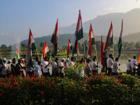 People are taking part in the Tiranga Rally ahead of India's Independence Day celebrations in Srinagar, Jammu and Kashmir, on August 12, 202...