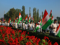 People are taking part in the Tiranga Rally ahead of India's Independence Day celebrations in Srinagar, Jammu and Kashmir, on August 12, 202...