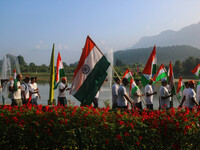 People are taking part in the Tiranga Rally ahead of India's Independence Day celebrations in Srinagar, Jammu and Kashmir, on August 12, 202...