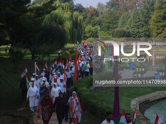 People are taking part in the Tiranga Rally ahead of India's Independence Day celebrations in Srinagar, Jammu and Kashmir, on August 12, 202...