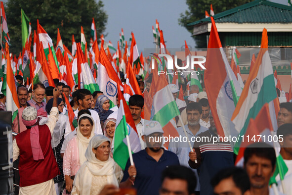 People are taking part in the Tiranga Rally ahead of India's Independence Day celebrations in Srinagar, Jammu and Kashmir, on August 12, 202...