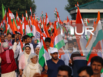 People are taking part in the Tiranga Rally ahead of India's Independence Day celebrations in Srinagar, Jammu and Kashmir, on August 12, 202...