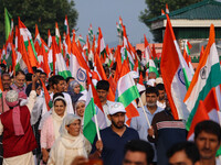 People are taking part in the Tiranga Rally ahead of India's Independence Day celebrations in Srinagar, Jammu and Kashmir, on August 12, 202...