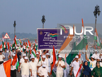 People are taking part in the Tiranga Rally ahead of India's Independence Day celebrations in Srinagar, Jammu and Kashmir, on August 12, 202...