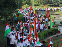 People are taking part in the Tiranga Rally ahead of India's Independence Day celebrations in Srinagar, Jammu and Kashmir, on August 12, 202...