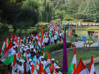 People are taking part in the Tiranga Rally ahead of India's Independence Day celebrations in Srinagar, Jammu and Kashmir, on August 12, 202...