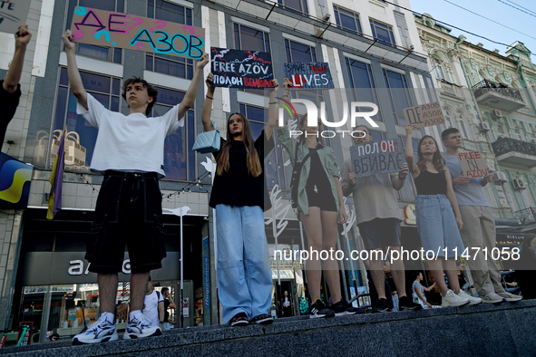 Activists are holding the Don't Be Silent. Captivity Kills! rally to support Ukrainian prisoners of war of the Mariupol Garrison as well as...