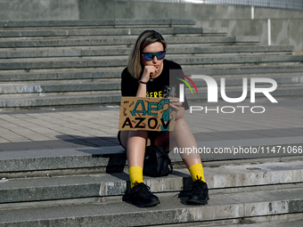 A woman is holding the 'Where Is Azov?' placard during the Don't Be Silent. Captivity Kills! rally in support of Ukrainian prisoners of war...