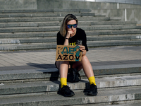 A woman is holding the 'Where Is Azov?' placard during the Don't Be Silent. Captivity Kills! rally in support of Ukrainian prisoners of war...