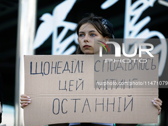 An activist is holding a placard during the Don't Be Silent. Captivity Kills! rally held to support Ukrainian prisoners of war of the Mariup...