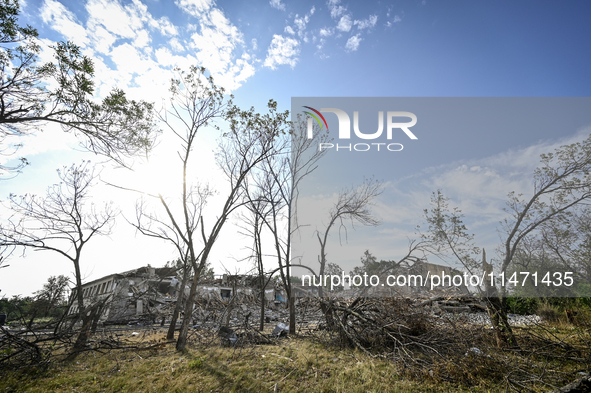 Trees are breaking by the shock wave near the Myrnohrad Infectious Diseases Hospital, which is destroyed by a Russian FAB-500 bomb on July 2...