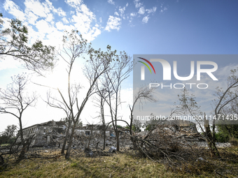 Trees are breaking by the shock wave near the Myrnohrad Infectious Diseases Hospital, which is destroyed by a Russian FAB-500 bomb on July 2...