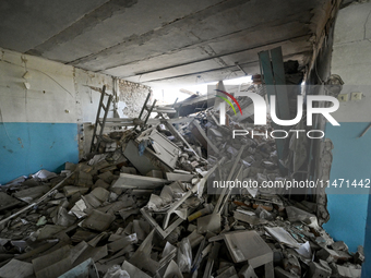 The ruins of the Myrnohrad Infectious Diseases Hospital, destroyed by a Russian FAB-500 bomb on July 27, 2024, are being pictured in Myrnohr...