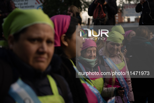 Pilgrims and workers are taking part in a march from the sanctuary at the San Cayetano Church to Plaza de Mayo Square in Buenos Aires, Argen...